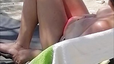Topless beach sunbathing